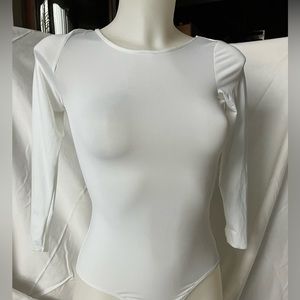 Leotard white buttoned at the bottom!